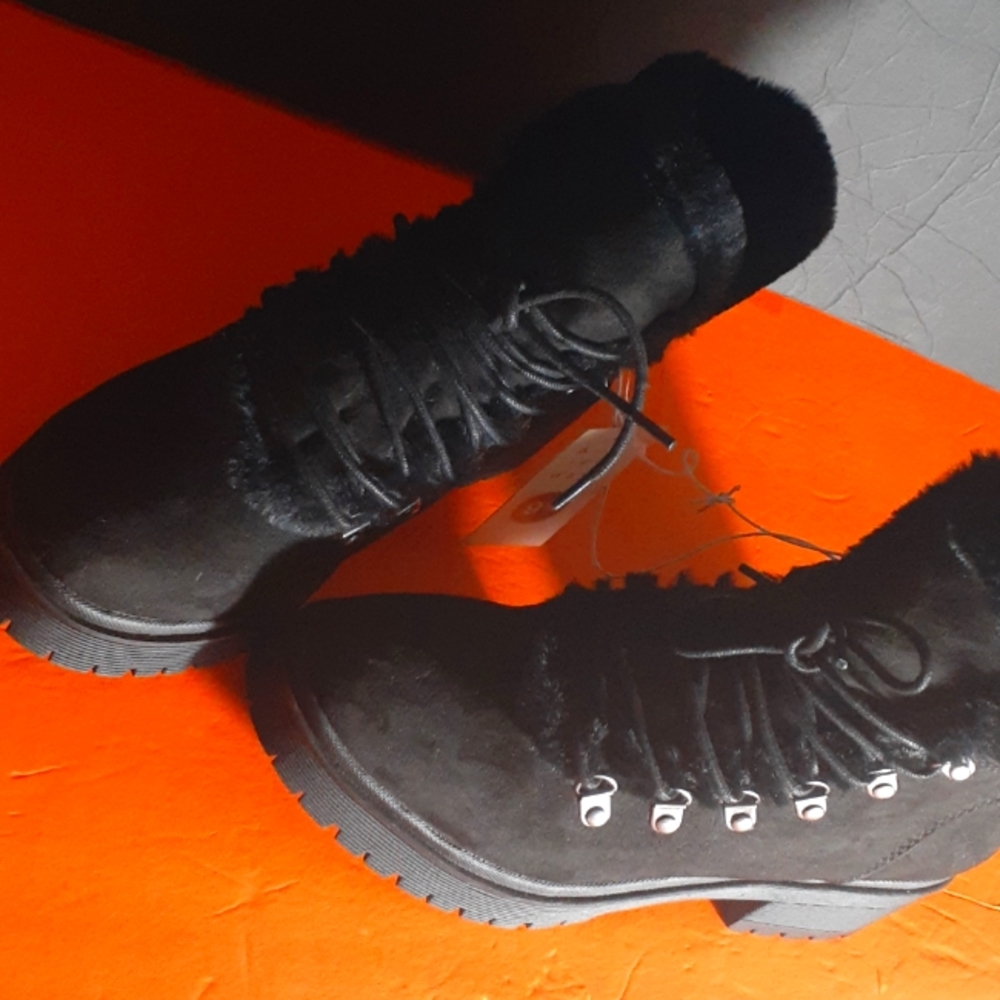 A. New Day Black 9.5 Boots